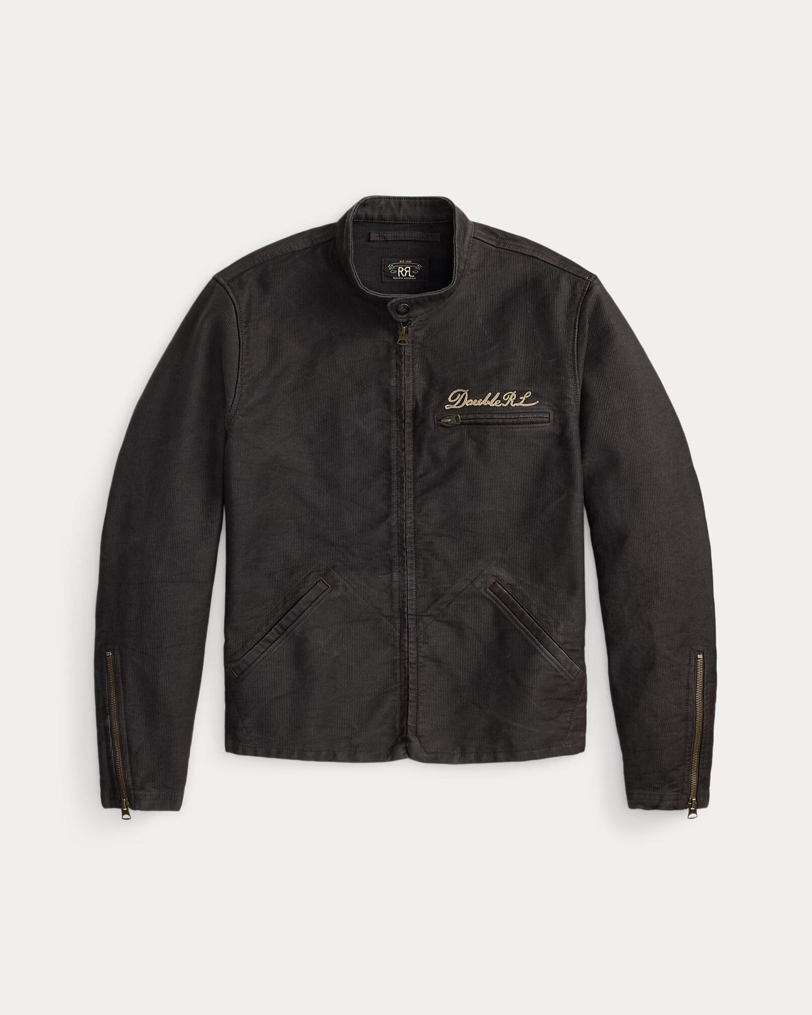 A dark charcoal gray zip-up jacket with a stand collar, featuring a gold embroidered script logo on the left chest and gold zipper accents on the cuffs, displayed against a light gray background.