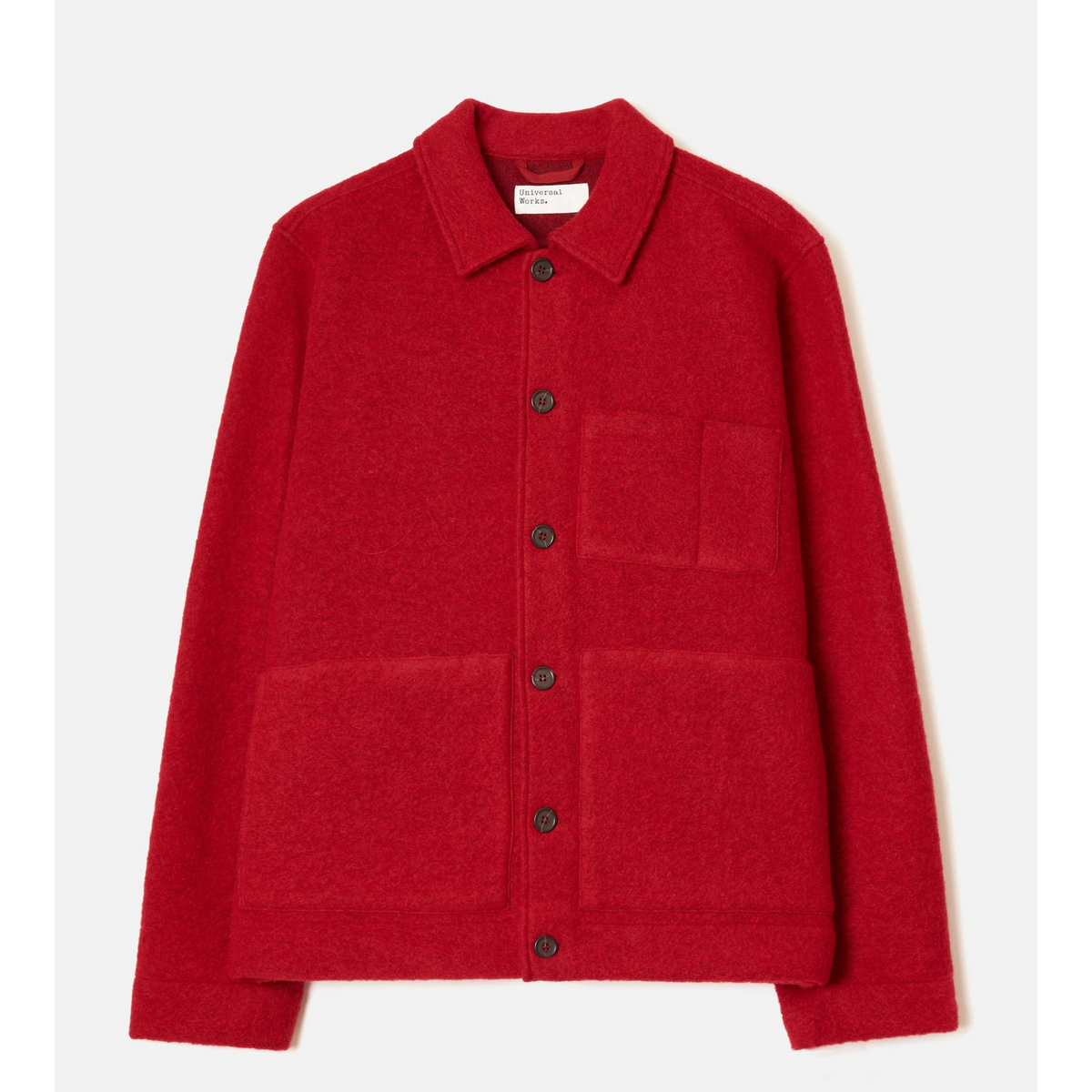 A red wool-blend utility cardigan jacket with a pointed collar, dark buttons, and a chest pocket, shown flat on a light gray background.