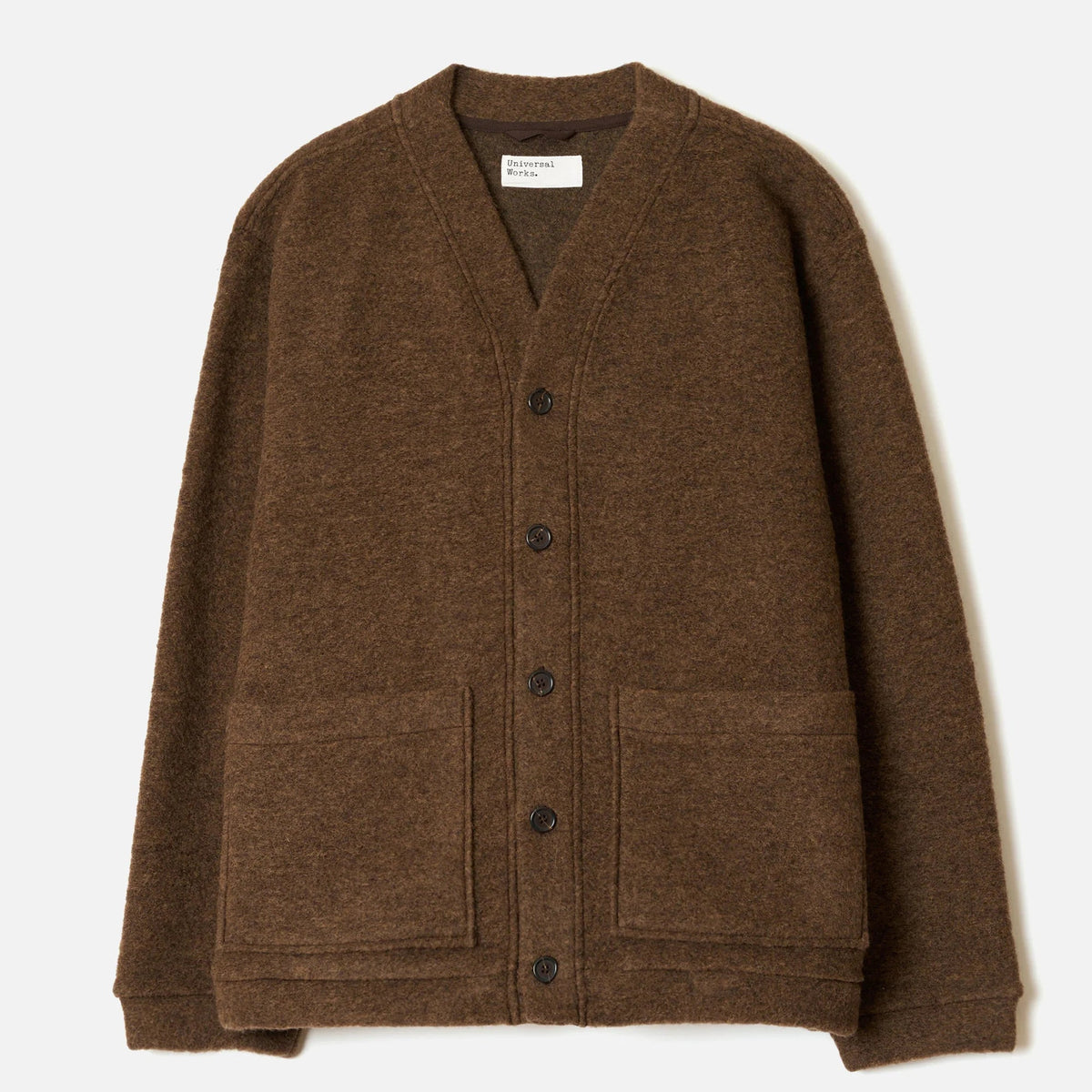 A brown knit cardigan sweater with a V-neck, dark buttons, and two front patch pockets, shown flat against a light off-white background.