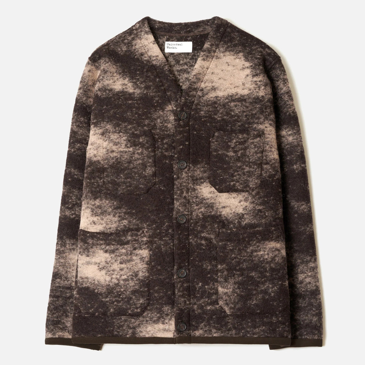 A long-sleeve button-front cardigan with a mottled, marbled pattern in dark brown and beige, laid flat against a light off-white background.