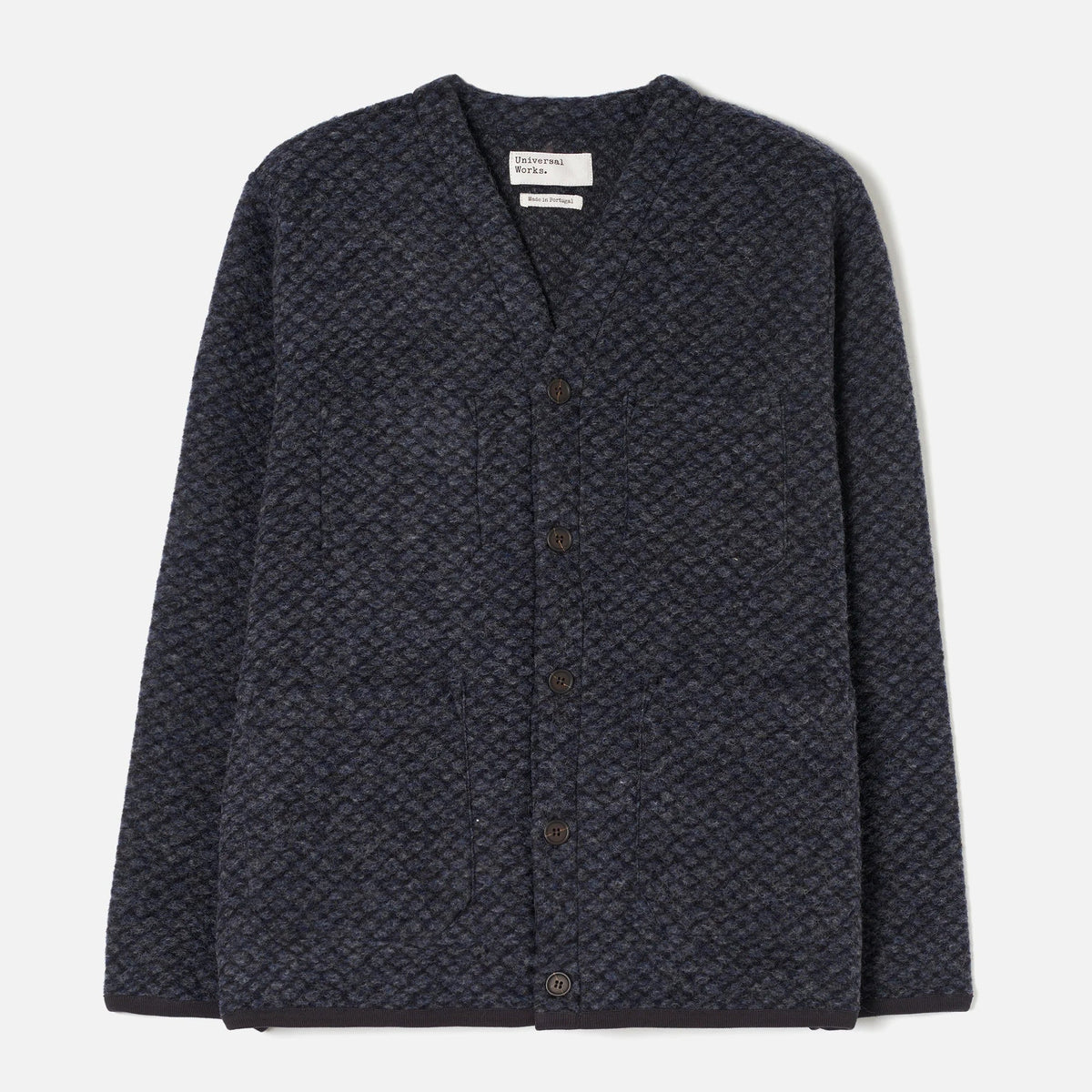 A dark navy blue textured cardigan sweater with a button-up front, laid flat against a light gray background.