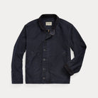 A dark navy blue canvas utility jacket with a corduroy collar, button-front closure, and side pockets, displayed flat against a light gray background.