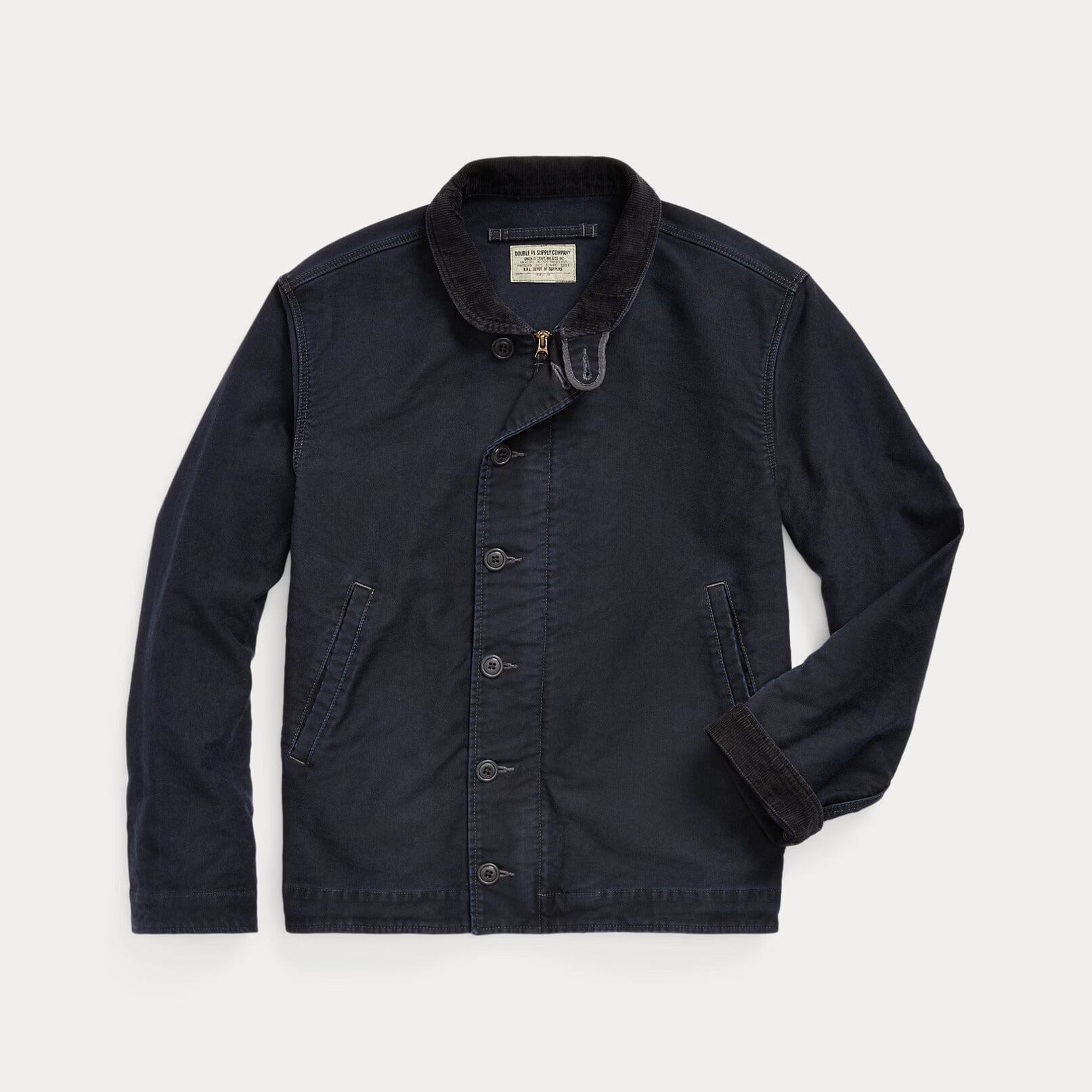 A dark navy blue canvas utility jacket with a corduroy collar, button-front closure, and side pockets, displayed flat against a light gray background.