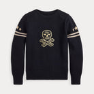 A dark navy blue knit crewneck sweater with a gold embroidered skull and crossbones graphic on the chest, featuring gold stripes and star details on the sleeves, set against a light gray background.
